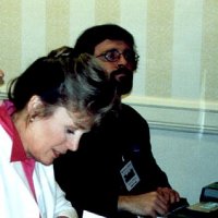 Kathryn Leigh Scott Cheerfully Signs A Fan's Book